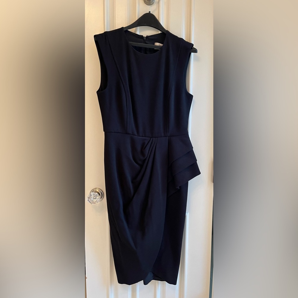 sleeveless ruffle draped dress with hidden zipper closure in back